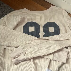 Edikted Cream Sweater with Blue Graphic
